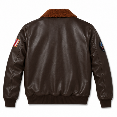 A dark brown faux leather bomber jacket shown from the back, featuring a brown sherpa collar, ribbed cuffs and hem, an American flag patch on the right sleeve, and a circular patch on the left sleeve.