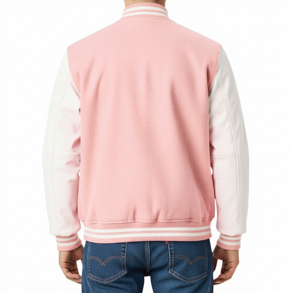 Person wearing a Baby pink and white varsity jacket on a white background