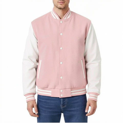 Baby Pink and white varsity jacket worn by a person on a white background