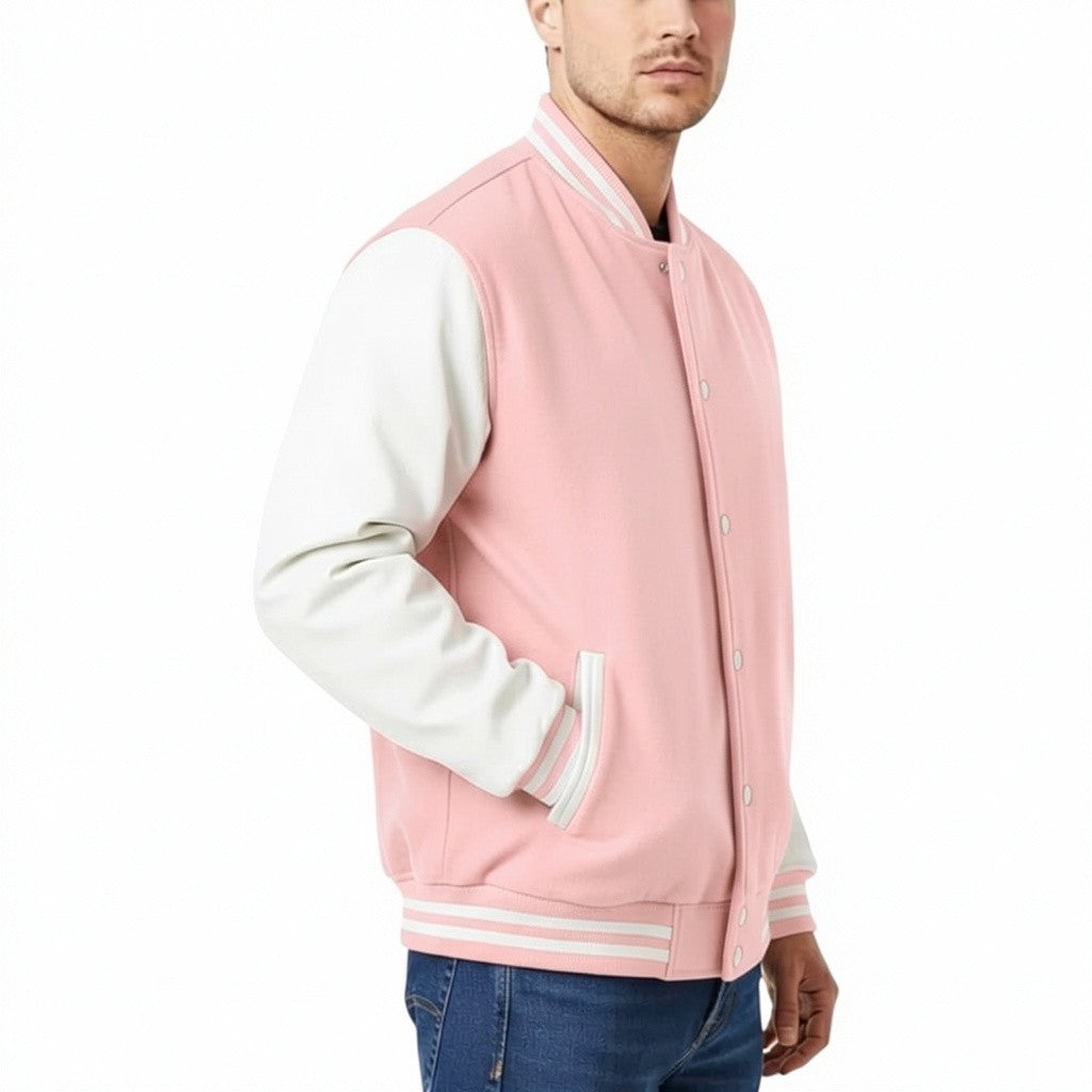 Baby Pink and white varsity jacket worn by a person on a white background