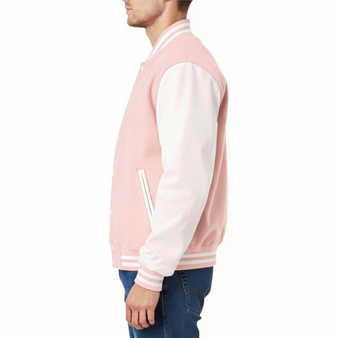 Person wearing a Baby pink and white varsity jacket on a white background
