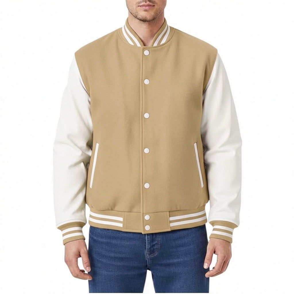 Camel and white varsity jacket worn by a person on a white background