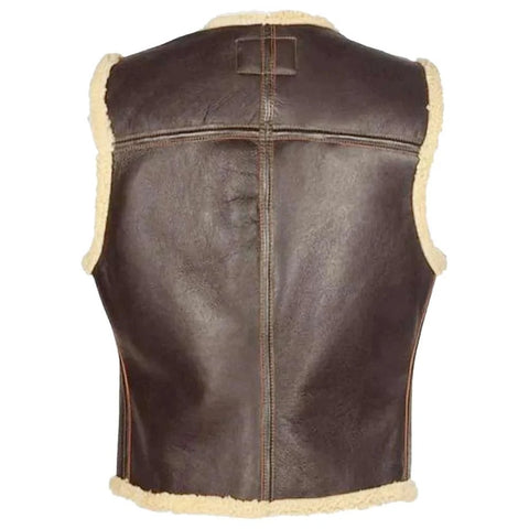 A dark brown leather aviator-style vest with cream-colored shearling lining on the edges and bottom hem, shown from the back against a plain white background.