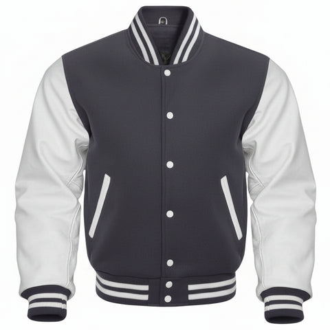 A varsity-style jacket with a dark gray body and white sleeves, featuring white buttons, striped ribbed collar, cuffs, and hem, and diagonal white welt pockets.