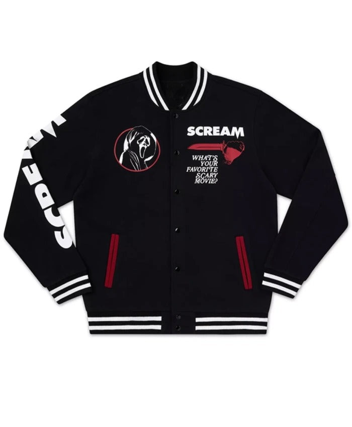 A black varsity-style bomber jacket featuring horror-themed graphics, including a circular Ghostface logo on the left chest, the word 'SCREAM' with a red knife graphic on the right chest, and 'SPOILERS' printed vertically in white on the right sleeve. The jacket has white and black striped ribbed collar, cuffs, and hem, with red pocket accents.