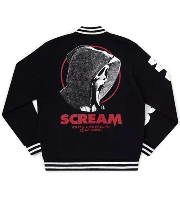 Black varsity-style jacket shown from the back, featuring a large graphic of the Scream mask inside a red circle, with 'SCREAM' printed in red and smaller white text below. The jacket has white and black striped ribbed collar, cuffs, and hem.