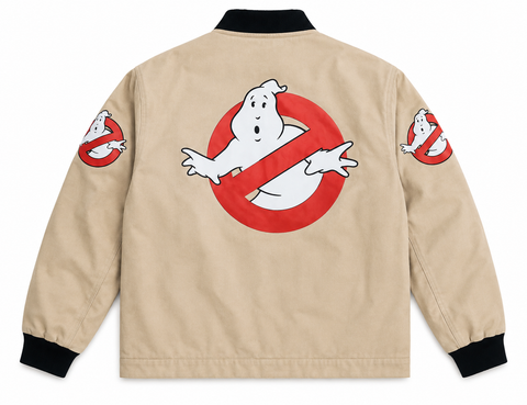 A beige bomber jacket shown from the back, featuring a large Ghostbusters logo on the center back and smaller matching logos on both sleeves. The jacket has black ribbed collar, cuffs, and hem, and is photographed on a clean white background.
