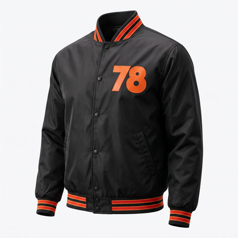 A black varsity-style jacket with orange and red striped ribbed trim and a large orange '78' printed on the chest, shown on a light gray background.