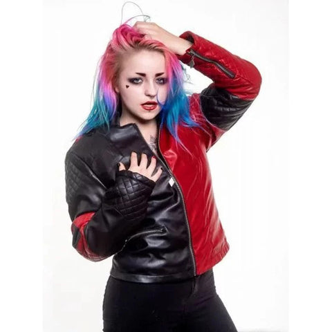 Person wearing a red and black jacket with colorful hair on a white background