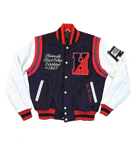 A varsity-style jacket with a navy blue body, white sleeves, and red and navy ribbed trim. The jacket features embroidered details, including a large red 'H' on the chest, white script text on the left chest, and a black-and-white 'H' patch on the right sleeve.