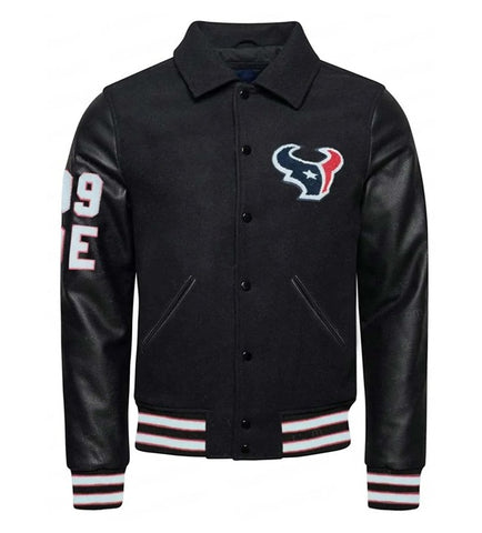 A black varsity-style jacket with black faux-leather sleeves, a black wool body, and the Houston Texans logo embroidered on the left chest. The jacket features white and red striped ribbed cuffs and hem, and white lettering on the sleeve.