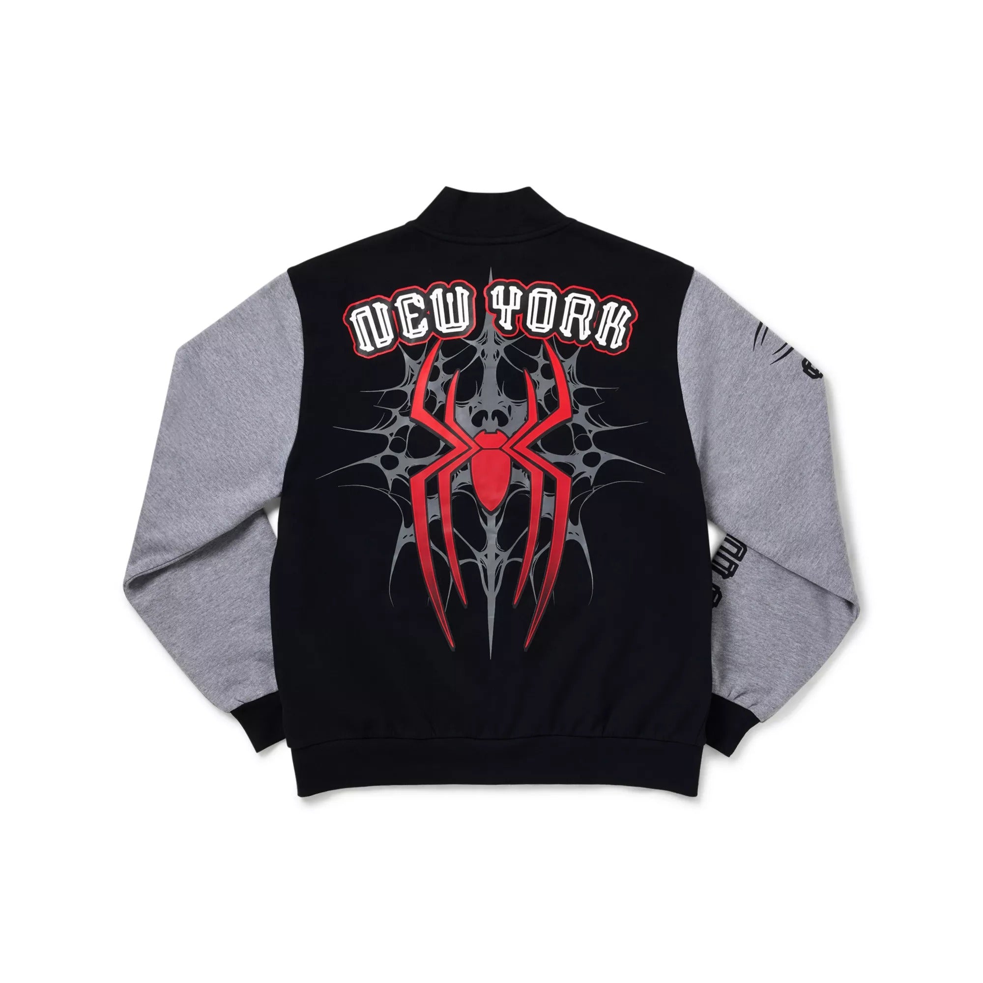 A black and gray varsity-style bomber jacket shown from the back, featuring a large red and gray spider graphic with 'NEW YORK' text across the upper back.