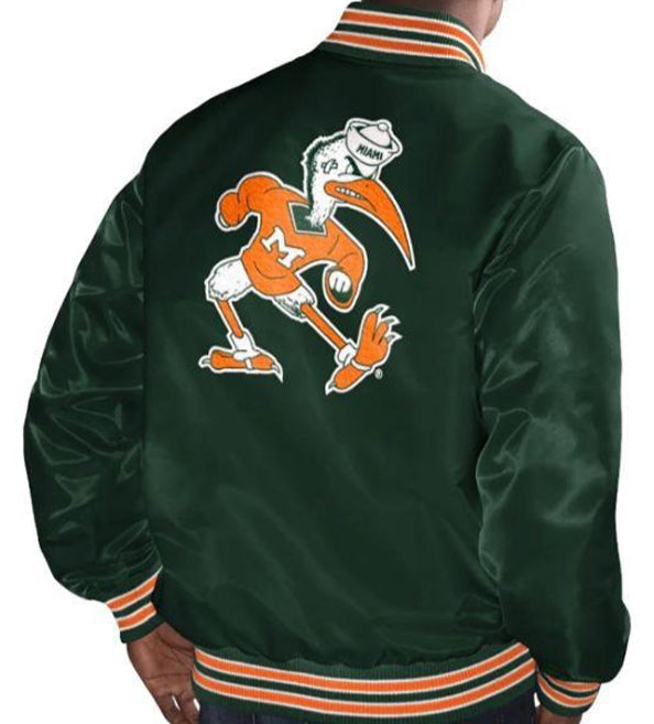 A dark green satin varsity jacket shown from the back, featuring a large orange and white cartoon mascot graphic on the back panel and striped ribbed collar, cuffs, and hem.