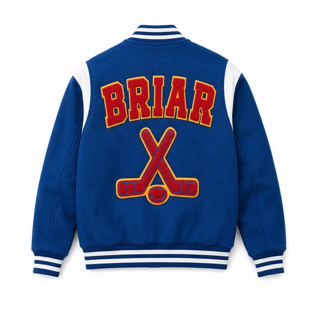A royal blue varsity-style jacket shown from the back, with white shoulder panels, striped ribbed collar/cuffs/hem, and large red lettering outlined in yellow reading 'BRIAR' above crossed hockey sticks and a puck.