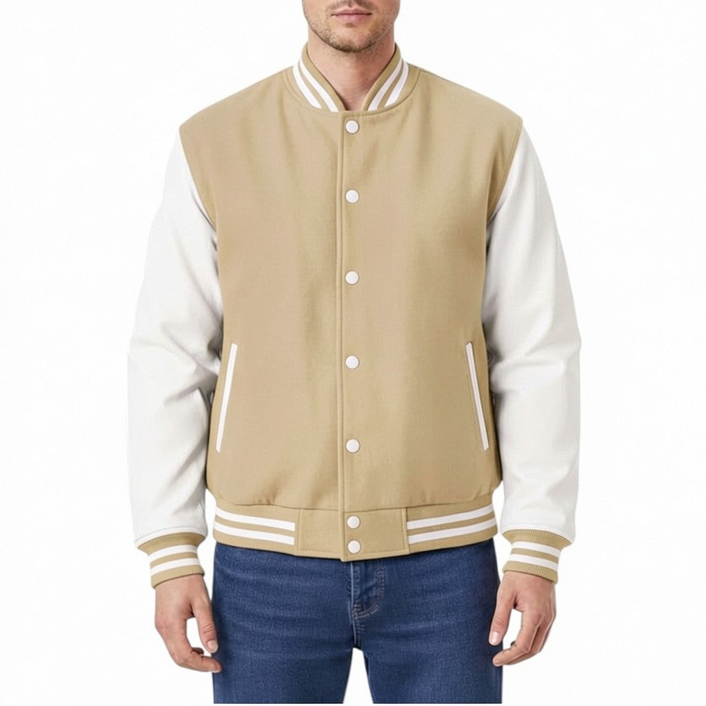 Tan and white varsity jacket worn by a person on a white background