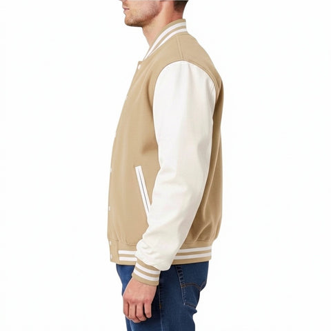 Man wearing a Tan and white varsity jacket on a white background